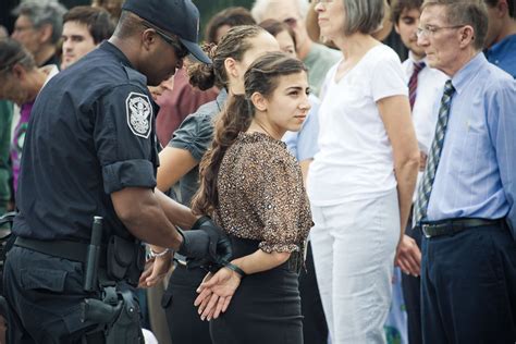 woman handcuffed arrested